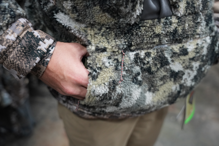 Showing the built in muff on the Sitka Fanatic Jacket